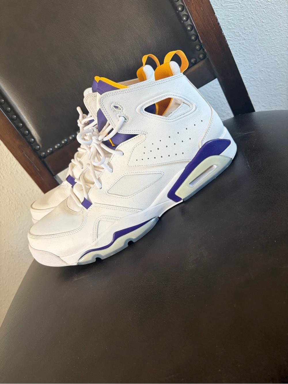 Nike Kids White High-Top Sneakers with Purple and Yellow Accents